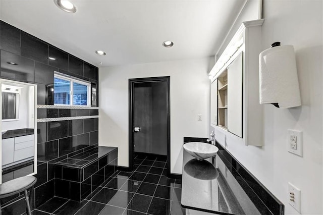 bathroom featuring tile patterned floors and vanity