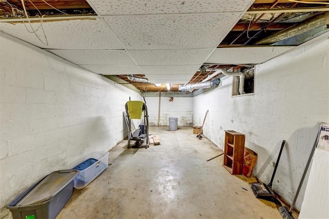 basement with a drop ceiling