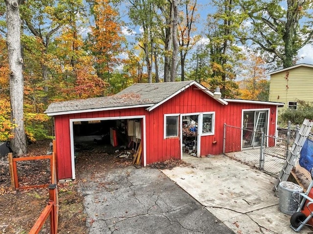 view of outbuilding featuring a garage