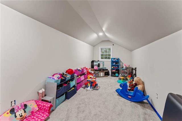 rec room with vaulted ceiling and carpet floors