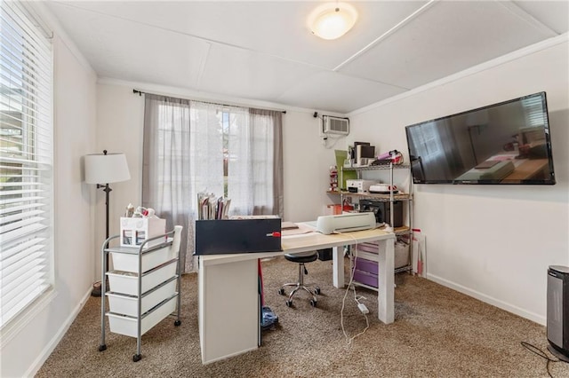 office area featuring baseboards, a wall mounted air conditioner, ornamental molding, and carpet floors