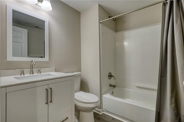 full bathroom with vanity, toilet, wood-type flooring, and shower / bath combo with shower curtain