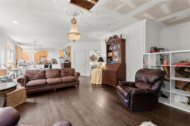 living room featuring ornamental molding, wood finished floors, and recessed lighting