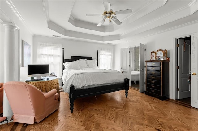 bedroom featuring a raised ceiling, visible vents, ornamental molding, a ceiling fan, and ornate columns