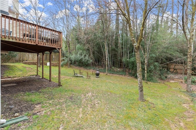 view of yard with a wooden deck