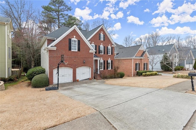 view of front of house featuring concrete driveway, brick siding, an attached garage, and a residential view