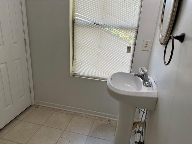 bathroom featuring tile patterned flooring