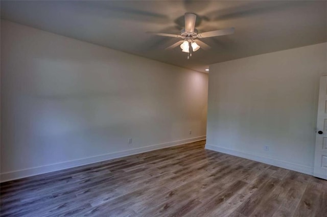 460 Ridge Point Dr, Monticello, GA 31064 - spare room with ceiling fan, wood finished floors, and baseboards