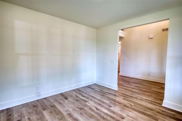 460 Ridge Point Dr, Monticello, GA 31064 - unfurnished room with wood finished floors and baseboards