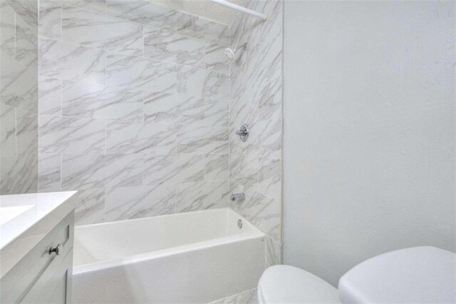 197 Dixboro Dr, Jonesboro, GA 30238 - bathroom featuring toilet, washtub / shower combination, and vanity