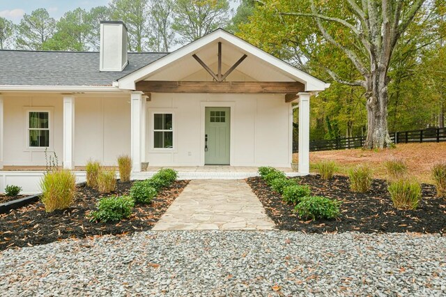 entrance to property with a porch