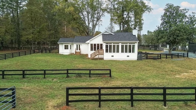 exterior space featuring a rural view