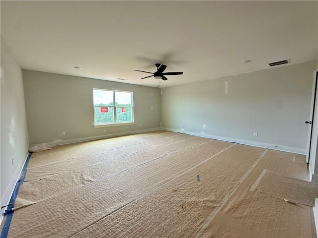 7040 Manchester Dr, Flowery Branch, GA 30542 - unfurnished room with ceiling fan, baseboards, and carpet