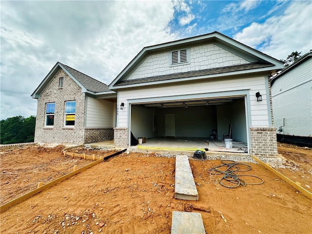 7040 Manchester Dr, Flowery Branch, GA 30542 - craftsman house featuring brick siding