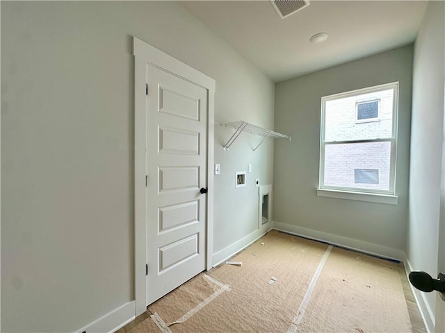 7040 Manchester Dr, Flowery Branch, GA 30542 - washroom with baseboards, hookup for a washing machine, hookup for an electric dryer, and carpet flooring
