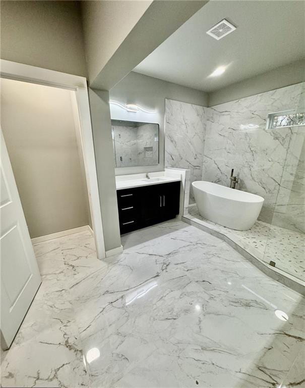 bathroom featuring vanity and plus walk in shower