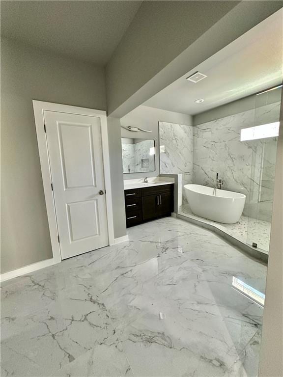 bathroom featuring vanity and a bathing tub