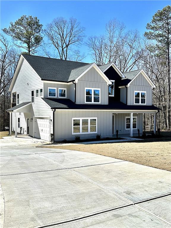 view of front of home with a garage