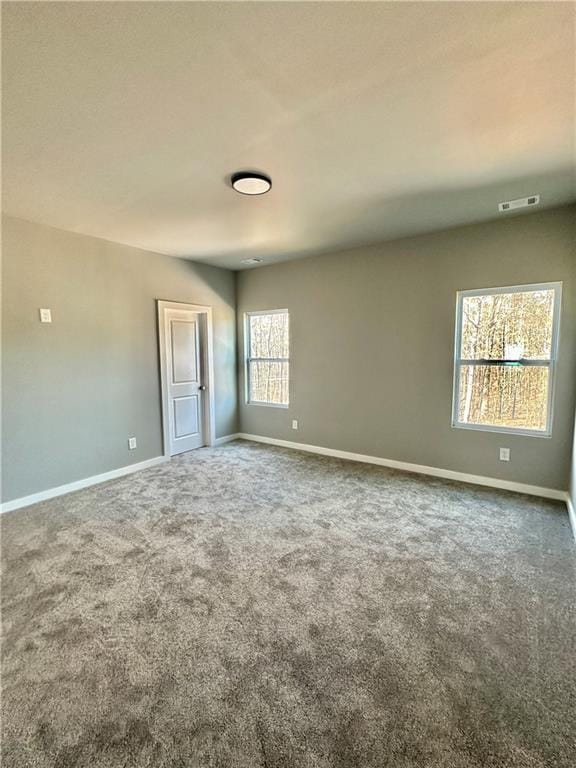 empty room with carpet floors