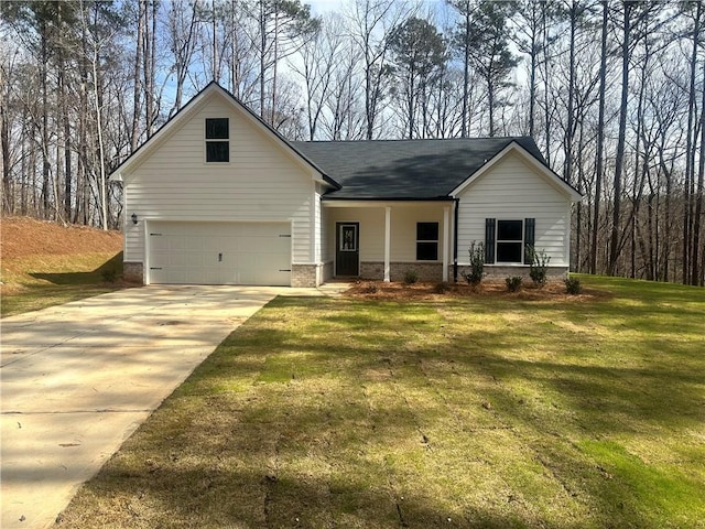 view of front facade featuring a front lawn, concrete driveway, and brick siding