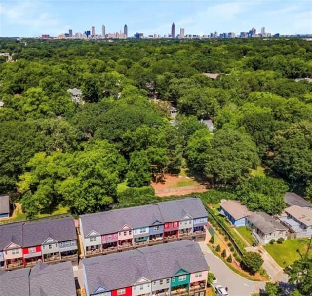 birds eye view of property featuring a city view