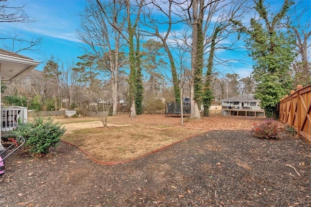 view of yard featuring a trampoline