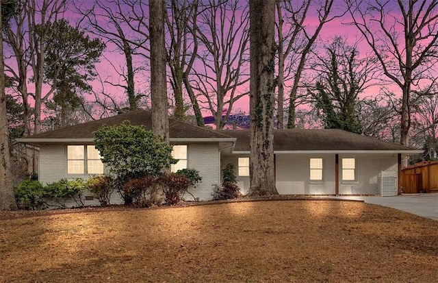 view of front of home featuring a carport