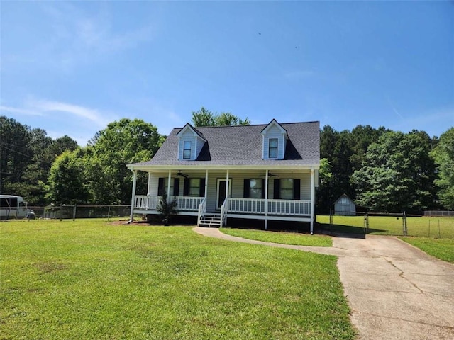 520 John Deere Rd, Monroe, GA 30656 - cape cod home with covered porch, driveway, a gate, ceiling fan, and a shingled roof