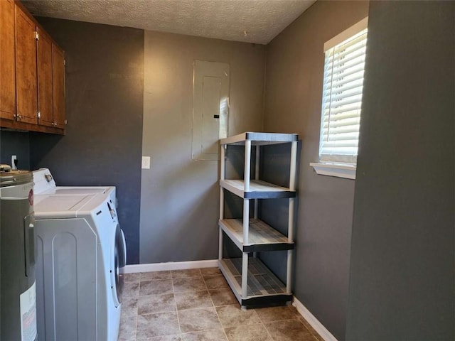 520 John Deere Rd, Monroe, GA 30656 - washroom featuring cabinet space, water heater, independent washer and dryer, plenty of natural light, and a textured ceiling