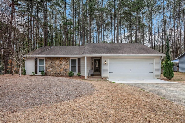 ranch-style home with aphalt driveway, a garage, stone siding, and roof with shingles