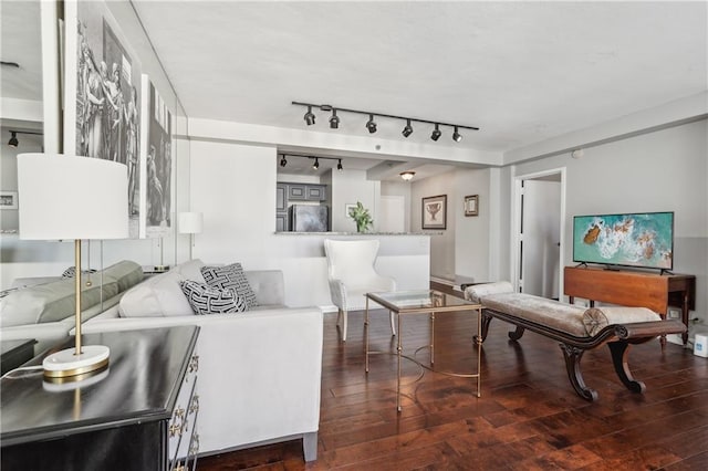 living room with dark hardwood / wood-style floors