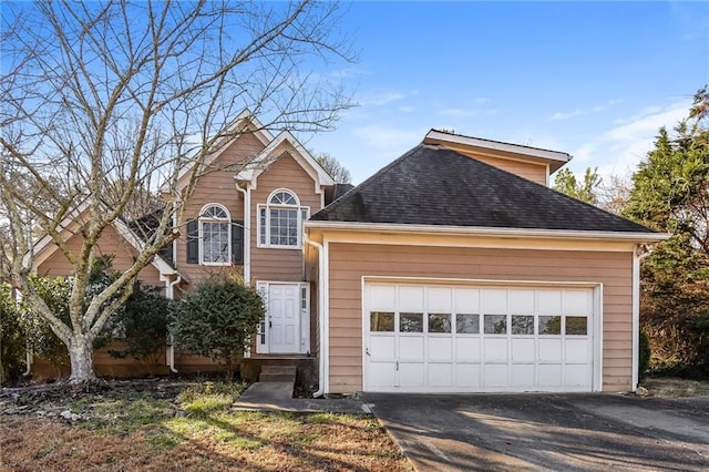 front of property with a garage