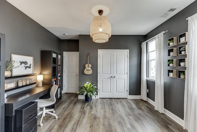 office with wood-type flooring