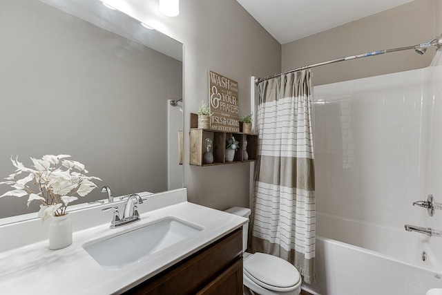 full bathroom featuring toilet, vanity, and shower / bathtub combination with curtain