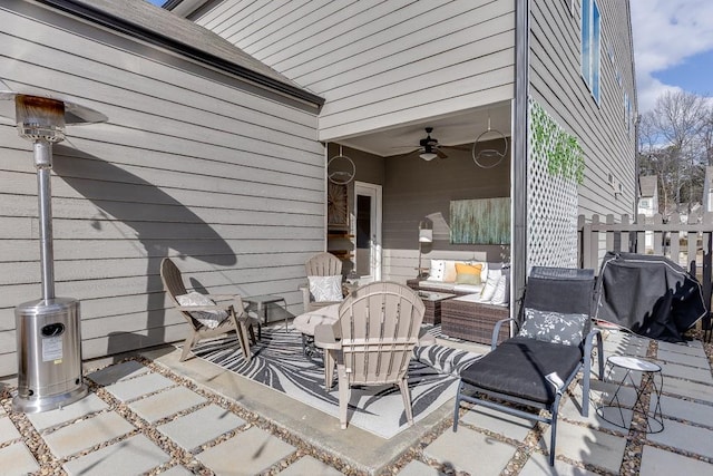 view of patio / terrace featuring ceiling fan, grilling area, and an outdoor hangout area