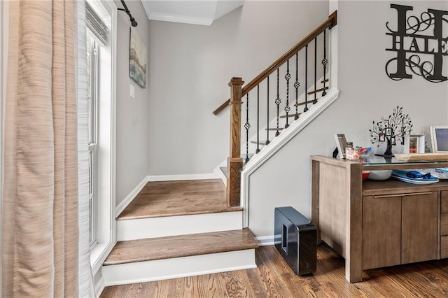 435 Ruby Forest Pkwy, Suwanee, GA 30024 - foyer entrance with wood finished floors, stairway, ornamental molding, and baseboards