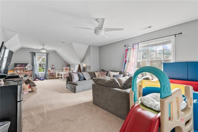 435 Ruby Forest Pkwy, Suwanee, GA 30024 - living area featuring ceiling fan, carpet floors, and vaulted ceiling
