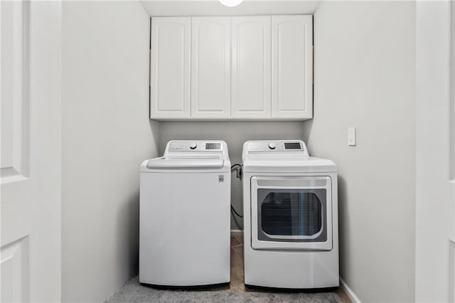 435 Ruby Forest Pkwy, Suwanee, GA 30024 - laundry room with separate washer and dryer, cabinet space, and baseboards