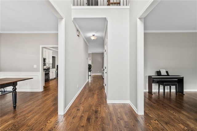 435 Ruby Forest Pkwy, Suwanee, GA 30024 - hall featuring crown molding, dark wood-style flooring, and baseboards
