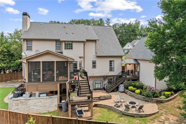 435 Ruby Forest Pkwy, Suwanee, GA 30024 - rear view of property with a fire pit, stairs, a deck, a patio area, and a sunroom