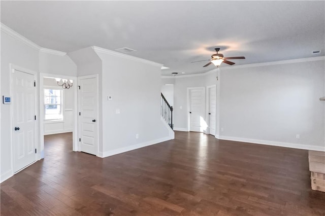 149 Elkins Blvd, Locust Grove, GA 30248 - empty room featuring dark hardwood / wood-style flooring, crown molding, and ceiling fan with notable chandelier