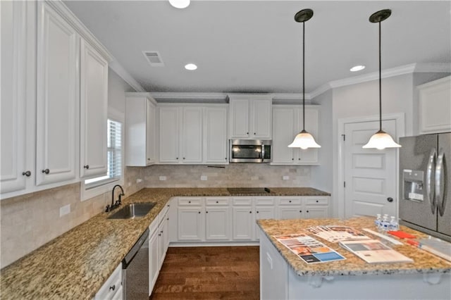 149 Elkins Blvd, Locust Grove, GA 30248 - kitchen with sink, tasteful backsplash, decorative light fixtures, appliances with stainless steel finishes, and white cabinets