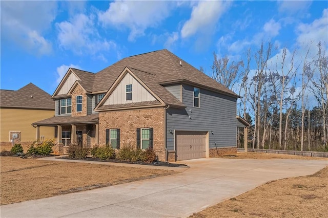 view of front of home featuring a garage and a porch