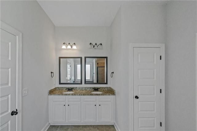 149 Elkins Blvd, Locust Grove, GA 30248 - bathroom with tile patterned floors and vanity