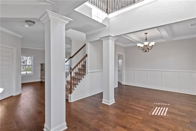 149 Elkins Blvd, Locust Grove, GA 30248 - entryway featuring a chandelier, ornamental molding, dark hardwood / wood-style flooring, beamed ceiling, and decorative columns