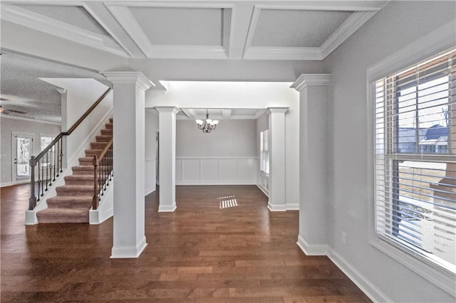 149 Elkins Blvd, Locust Grove, GA 30248 - interior space with an inviting chandelier, decorative columns, coffered ceiling, ornamental molding, and beamed ceiling