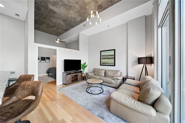 44 Peachtree Pl NW Unit 528, Atlanta, GA 30309 - living area featuring light wood-style flooring and a ceiling fan