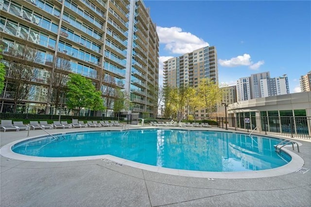 44 Peachtree Pl NW Unit 528, Atlanta, GA 30309 - pool featuring fence and a patio