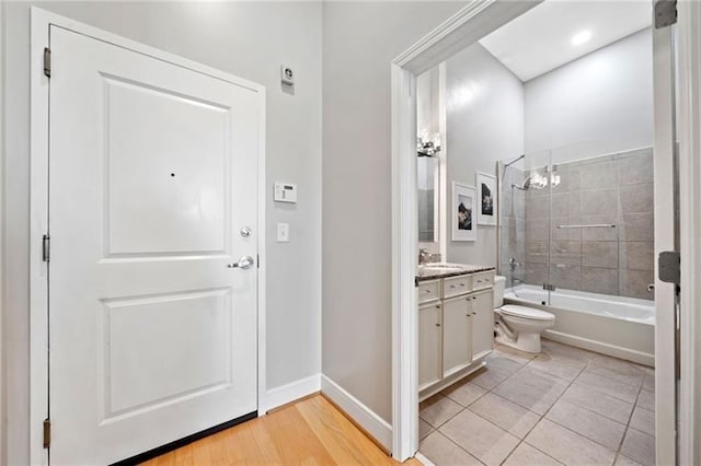 44 Peachtree Pl NW Unit 528, Atlanta, GA 30309 - full bath with toilet, shower / bathtub combination, vanity, and baseboards
