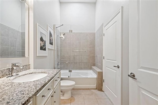44 Peachtree Pl NW Unit 528, Atlanta, GA 30309 - bathroom featuring bathing tub / shower combination, toilet, vanity, and tile patterned floors